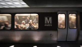 A Metro train departs the Gallery Place-Chinatown Metro Station, Thursday, Jan. 11, 2018, in Washington. Washington&#39;s Metro system has become internationally synonymous with delays, breakdowns and smoke-filled tunnels. (AP Photo/Alex Brandon) ** FILE **