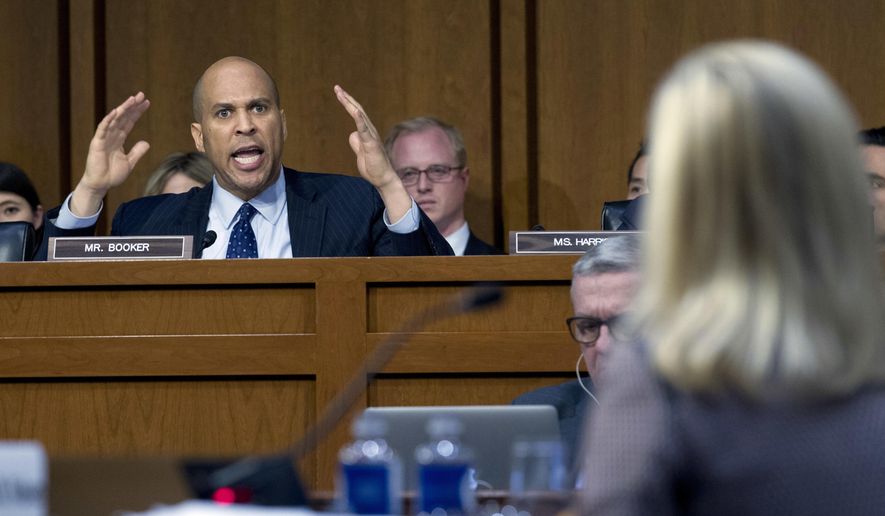 Sen. Cory Booker D-N.J., questions Homeland Security Secretary Kirstjen Nielsen during a hearing before the Senate Judiciary Committee on Capitol Hill, Tuesday, Jan. 16, 2018, in Washington. ( AP Photo/Jose Luis Magana)
