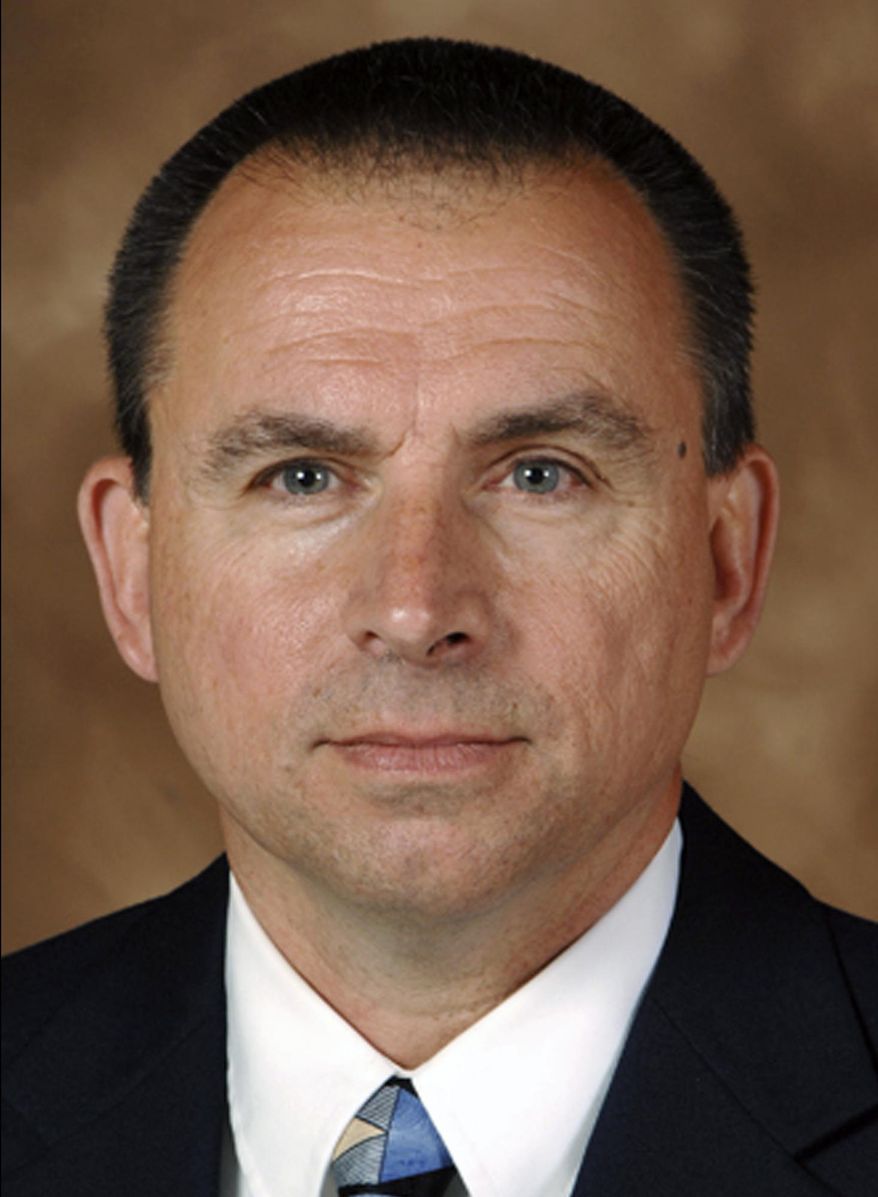 FILE - This undated file photo provided by the Iowa Department of Public Safety shows former Division of Criminal Investigation agent Larry Hedlund. A wrongful termination lawsuit brought by Hedlund is publicly airing years of dirty laundry from the Iowa Department of Public Safety. Thousands of pages of court documents reveal previously secret misconduct as attorneys for Hedlund argue he was unfairly fired in 2013 after complaining about speeding by then-Gov. Terry Branstad's security detail. The Iowa Attorney General's Office has asked a judge to dismiss the case before a trial that's scheduled for April 2018. (Iowa Department of Public Safety via AP, File)