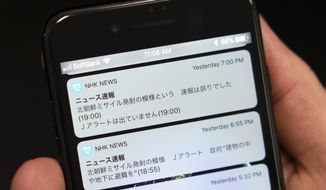 A smartphone shows Tuesday&#39;s NHK television&#39;s news website saying &amp;quot;North Korea appears to have fired a missile,&amp;quot; &amp;quot;The government: Seek shelter inside buildings and basements,&amp;quot; second from top, in Tokyo Wednesday, Jan. 17, 2018. The Japan&#39;s public broadcaster mistakenly sent an alert on Tuesday warning citizens of a North Korean missile launch and urging them to seek immediate shelter, then minutes later corrected it, top, days after a similar error in Hawaii. The message at top reads: &amp;quot;The flash of North Korea&#39;s missile launch was a mistake.&amp;quot; (AP Photo/Eugene Hoshiko)