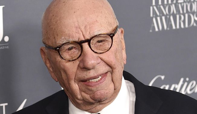 FILE - In this Wednesday, Nov. 1, 2017, file photo, Fox News chairman and CEO Rupert Murdoch attends the WSJ. Magazine 2017 Innovator Awards at The Museum of Modern Art in New York. Murdoch has told senior managers at 21st Century Fox that he will be working from home for a few weeks after a recent back injury in a sailing accident. (Photo by Evan Agostini/Invision/AP, File)
