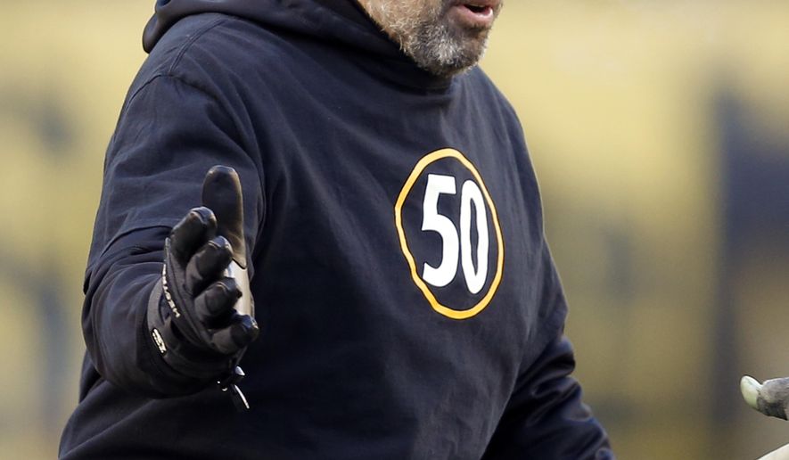 FILE - In this Jan. 14, 2018, file photo, Pittsburgh Steelers offensive coordinator Todd Haley greets players as they come from the field during the second half of an NFL divisional football AFC playoff game against the Jacksonville Jaguars in Pittsburgh. A person with direct knowledge of the decision, confirmed to The Associated Press that the Steelers will not renew Haley's contract. The person spoke on condition of anonymity Wednesday, Jan. 17, 2018, because there was no formal announcement from Haley nor the team. Haley just finished his sixth season with the team. (AP Photo/Keith Srakocic, File)