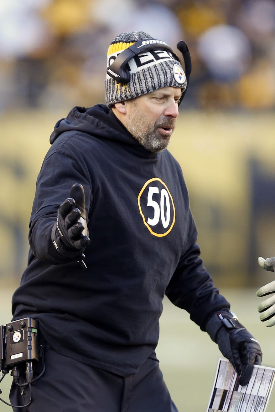FILE - In this Jan. 14, 2018, file photo, Pittsburgh Steelers offensive coordinator Todd Haley greets players as they come from the field during the second half of an NFL divisional football AFC playoff game against the Jacksonville Jaguars in Pittsburgh. A person with direct knowledge of the decision, confirmed to The Associated Press that the Steelers will not renew Haley's contract. The person spoke on condition of anonymity Wednesday, Jan. 17, 2018, because there was no formal announcement from Haley nor the team. Haley just finished his sixth season with the team. (AP Photo/Keith Srakocic, File)