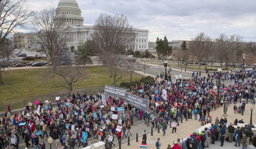 Pro-life demonstrators arrive on Capitol Hill for the March for Life, marking the anniversary of the 1973 Supreme Court decision legalizing abortion. Organizers say Donald Trump will become the first sitting president to address the gathering, speaking live from the White House. (Associated Press)