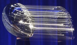 The Vince Lombardi Trophy is seen before NFL Commissioner Roger Goodell&#x27;s news conference during preparations for the NFL Super Bowl 51 football game Wednesday, Feb. 1, 2017, in Houston. (AP Photo/David J. Phillip)