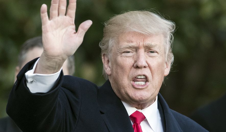 President Donald Trump waves to media as he arrives on Marine One at the White House in Washington, Thursday, Jan. 18, 2018, as he returns from Pittsburgh. (AP Photo/Carolyn Kaster)