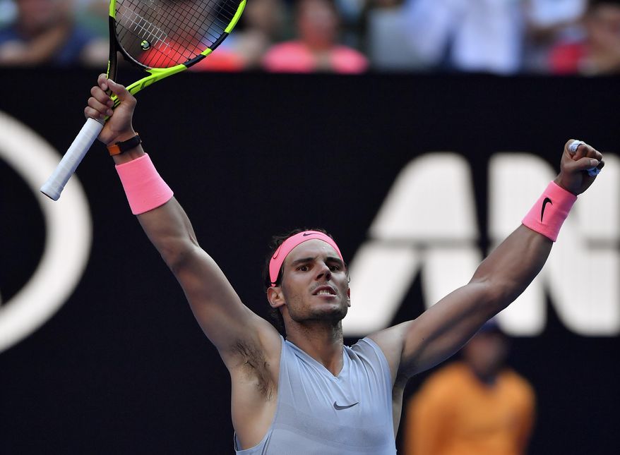 Spain's Rafael Nadal celebrates after defeating Argentina's Leonardo Mayer during their second round match at the Australian Open tennis championships in Melbourne, Australia, Wednesday, Jan. 17, 2018. (AP Photo/Andy Brownbill)