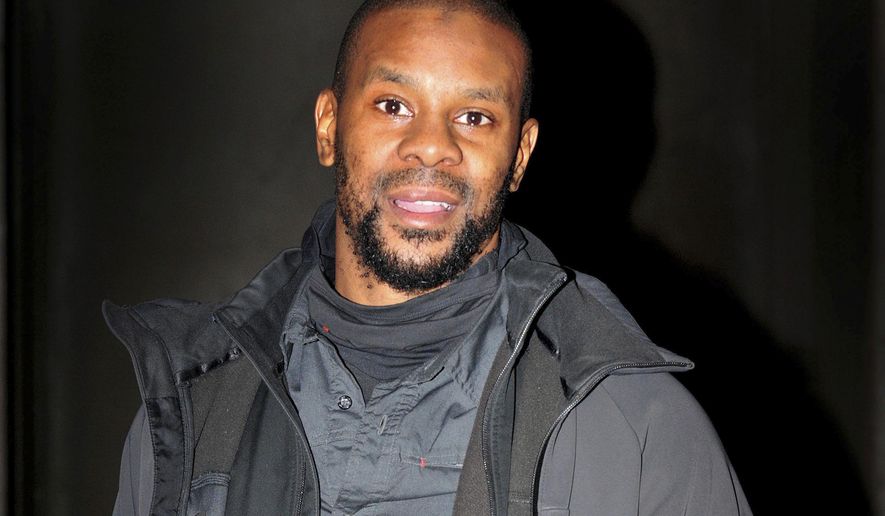 FILE - In this file photo dated Nov. 23, 2015, British former boxing champion Anthony Small. British police said Thursday Jan. 18, 2018, that 36-year old Muslim convert Anthony Small has been charged with encouraging acts of terrorism, after posting a video on social media in September 2016, which they assert violates anti-terrorism laws. (Nick Ansell/PA FILE via AP)