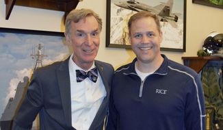 In this photo dated February, 2017 and provided by the Office of Congressman Jim Bridenstine, Bill Nye, left, and Jim Bridenstine, right, pose for a photo. Bridenstine, President Donald Trump’s pick to head NASA, says he plans to invite Bill Nye &amp;quot;The Science Guy&amp;quot; to be his guest of honor at President Trump&#39;s State of the Union address on Jan. 30, 2018. (Megan Wenrich/Office of Congressman Jim Bridenstine via AP)