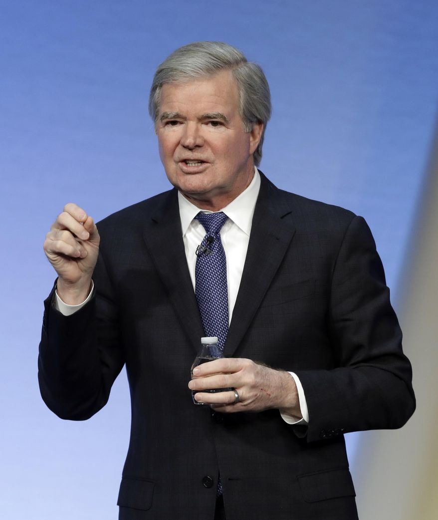 NCAA President Mark Emmert speaks during the NCAA Convention, Thursday, Jan. 18, 2018, in Indianapolis.  Emmert says the governing must act on a set of recommendations to clean up college basketball before the start of next season. He expects to receive the report from an independent commission by April 25. The Board of Governors will then be expected to vote on formal proposals at their August meeting. (AP Photo/Darron Cummings)