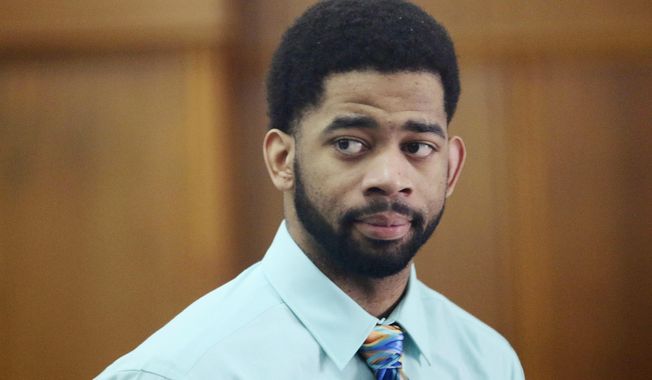 FILE - In this June 20, 2017, file photo, former Milwaukee police officer Dominique Heaggan-Brown appears in Milwaukee County Court in Milwaukee. Heaggan-Brown, who was acquitted of fatally shooting a black man, sparking two nights of riots, pleaded guilty, Thursday, Jan. 18, 2018, to lesser charges in sexual assault cases that had gotten him fired. (Michael Sears/Milwaukee Journal-Sentinel via AP, Pool, File)