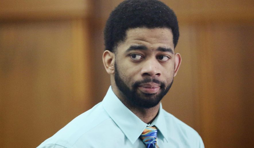 FILE - In this June 20, 2017, file photo, former Milwaukee police officer Dominique Heaggan-Brown appears in Milwaukee County Court in Milwaukee. Heaggan-Brown, who was acquitted of fatally shooting a black man, sparking two nights of riots, pleaded guilty, Thursday, Jan. 18, 2018, to lesser charges in sexual assault cases that had gotten him fired. (Michael Sears/Milwaukee Journal-Sentinel via AP, Pool, File)