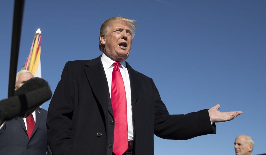 President Donald Trump speaks to the media at the Pentagon, Thursday, Jan. 18, 2018. At right is White House Chief of Staff John Kelly. (AP Photo/Carolyn Kaster)