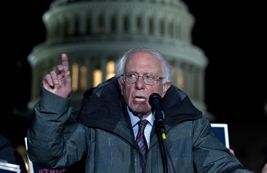 Sen. Bernie Sanders, I-Vt., speaks during a rally in support of the Deferred Action for Childhood Arrivals (DACA), and to avoid the government shut down on Capitol Hill, Friday, Jan. 19, 2018, in Washington. ( AP Photo/Jose Luis Magana)