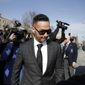 Michael &quot;The Situation&quot; Sorrentino, one of the former stars of the &quot;Jersey Shore&quot; reality TV show, is swarmed by reporters while leaving the Martin Luther King, Jr., Federal Courthouse after a hearing, Friday, Jan. 19, 2018, in Newark, N.J. Sorrentino pleaded guilty to one count of tax evasion and admitted concealing his income in 2011 by making cash deposits in amounts that wouldn&#39;t trigger federal reporting requirements. He and his brother, Marc, were charged in 2014 and again last year with multiple counts related to nearly $9 million in income from the show. (AP Photo/Julio Cortez)