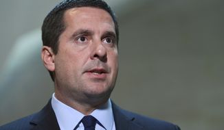 Additional sources say the memo, which was compiled by committee chairman Rep. Devin Nunes and his staff, is critical of the deputy attorney general and now-former deputy FBI director for their oversight roles.(AP Photo/Susan Walsh, File)