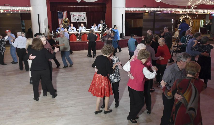 In this Monday, Nov. 6, 2017 photo, Dancers move around the Kato Ballroom floor to the music of The Polka Dots during a taping of "Bandwagon" at the Kato Ballroom in Mankato, Minn. (Pat Christman/The Free Press via AP)