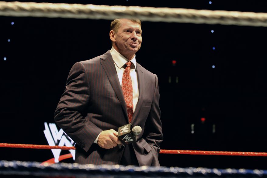 In this Oct. 30, 2010, photo, WWE chairman and CEO Vince McMahon speaks to an audience during a WWE fan appreciation event in Hartford, Conn. (AP Photo/Jessica Hill) **FILE **