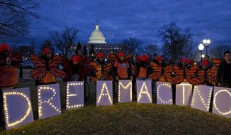 Demonstrators rally in support of Deferred Action for Childhood Arrivals (DACA) outside the Capitol, Sunday, Jan. 21, 2018, in Washington. (AP Photo/Jose Luis Magana) ** FILE **