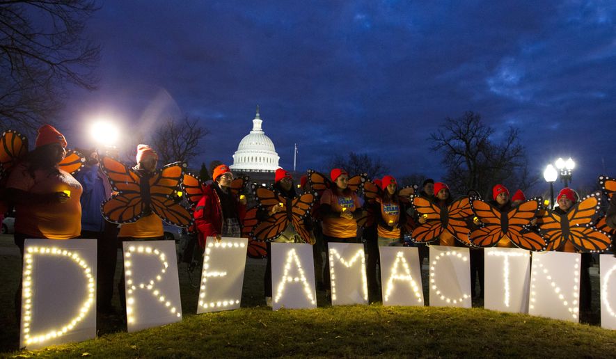 Demonstrators rally in support of Deferred Action for Childhood Arrivals (DACA) outside the Capitol, Sunday, Jan. 21, 2018, in Washington, on the second day of the federal shutdown. (AP Photo/Jose Luis Magana) ** FILE **