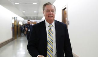 Sen. Lindsey Graham, R-S.C., leaves after meeting with a bipartisan group of senators, Monday Jan. 22, 2018, on Day. (AP Photo/Jacquelyn Martin)