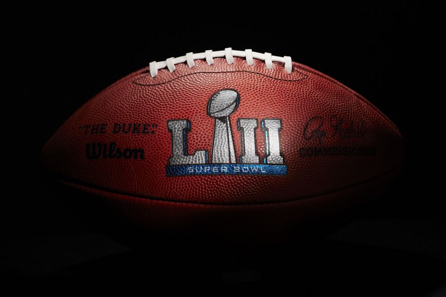 An official ball for the NFL Super Bowl LII football game from the Wilson Sporting Goods Co. in Ada, Ohio, Monday, Jan. 22, 2018. The New England Patriots will play the Philadelphia Eagles in the Super Bowl on Feb. 4, in Minneapolis, MN. (AP Photo/Rick Osentoski)