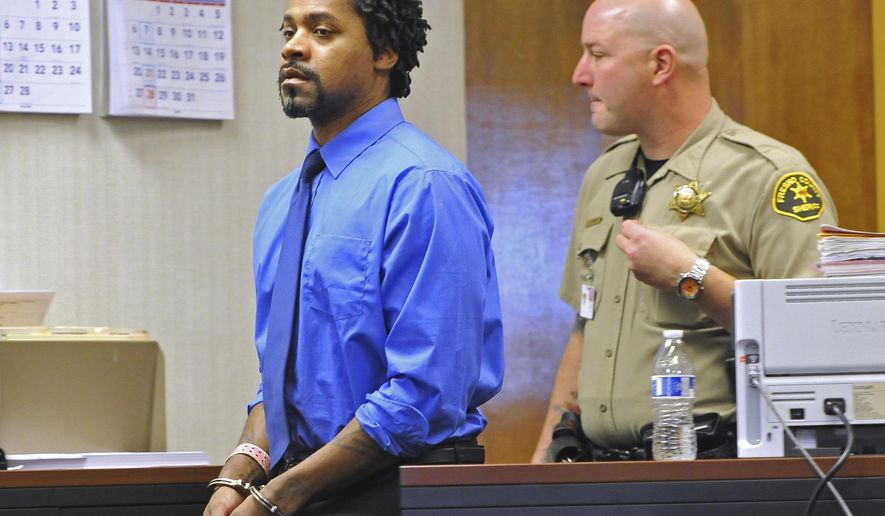 Kori Ali Muhammad is led into a courtroom Monday, Jan. 21, 2018, for a competency hearing in Fresno, Calif. A Northern California judge says Kori Ali Muhammad, charged with killing four people and shooting at three others in April is mentally fit to stand trial. A Fresno County judge rejected Kori Ali Muhammad's arguments that he has been diagnosed with paranoid schizophrenia and was not sane at the time of the shootings. (John Walker/Fresno Bee via AP)