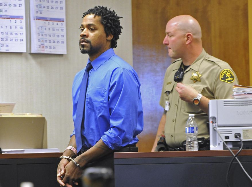 Kori Ali Muhammad is led into a courtroom Monday, Jan. 21, 2018, for a competency hearing in Fresno, Calif. A Northern California judge says Kori Ali Muhammad, charged with killing four people and shooting at three others in April is mentally fit to stand trial. A Fresno County judge rejected Kori Ali Muhammad's arguments that he has been diagnosed with paranoid schizophrenia and was not sane at the time of the shootings. (John Walker/Fresno Bee via AP)