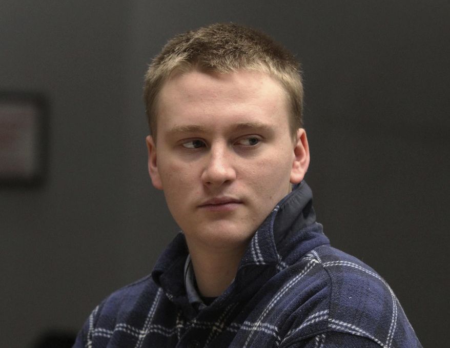Owen Morris appears in district court in Providence, R.I., on Tuesday, Jan. 23, 2018, to face a first-degree murder charge. He is charged in the slaying of Clive Bridgham, who was found dead in his East Providence home, the police announced in a statement Monday night. (Steve Szydlowski/Providence Journal via AP, Pool)