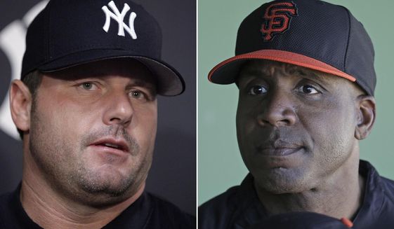 FILE - At left is a 2007 file photo showing New York Yankees baseball player Roger Clemens. At right is a 2014 file photo showing former San Francisco Giants baseball player Barry Bonds. Bonds and Clemens will probably have to wait a little longer to get into the Baseball Hall of Fame.  (AP Photo/File)