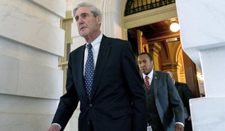 In this June 21, 2017, photo, former FBI Director Robert Mueller, the special counsel probing Russian interference in the 2016 election, departs Capitol Hill following a closed-door meeting in Washington. (AP Photo/Andrew Harnik, File)