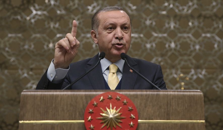 Turkey&#39;s President Recep Tayyip Erdogan told local administrators in Ankara on Wednesday that the military&#39;s incursion into a Kurdish-held enclave in Syria was progressing &quot;successfully&quot; and would continue until the last &quot;terrorist&quot; is eliminated. (Associated Press/File)