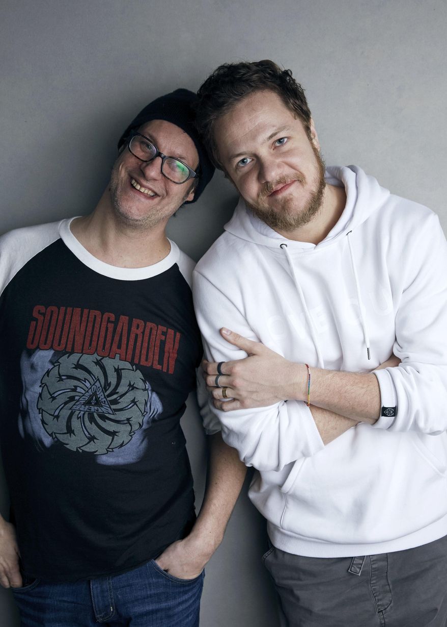 Director Don Argott, left, and Dan Reynolds pose for a portrait to promote the film, "Believer," at the Music Lodge during the Sundance Film Festival on Sunday, Jan. 21, 2018, in Park City, Utah. The Mormon frontman of the Imagine Dragons rock band hopes the Sundance Film Festival documentary that follows his journey to becoming an advocate for LGBT Mormon youth triggers real change by his religion’s leaders and puts an end to what he calls shaming of gay and lesbian kids in the religion. (Photo by Taylor Jewell/Invision/AP)