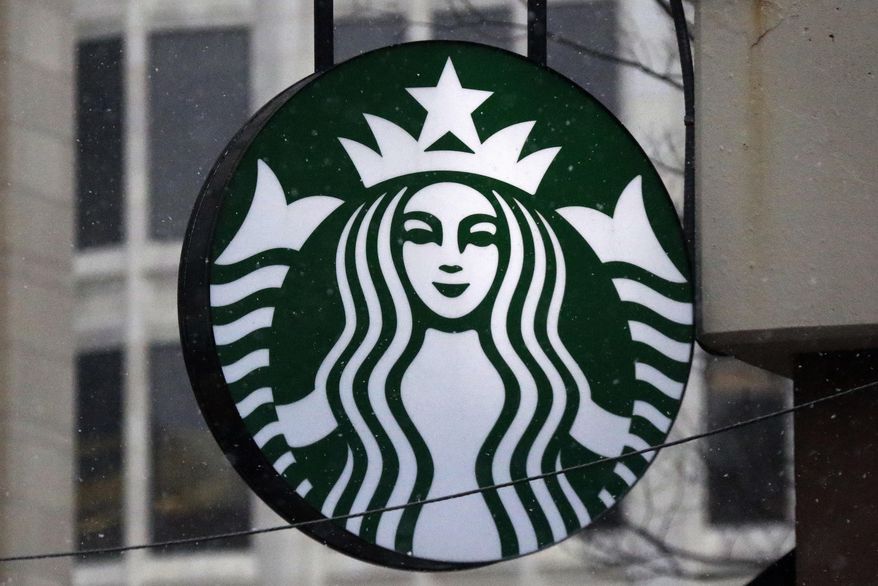 This Tuesday, March 14, 2017, photo shows the Starbucks logo on a shop in downtown Pittsburgh. (AP Photo/Gene J. Puskar, File)