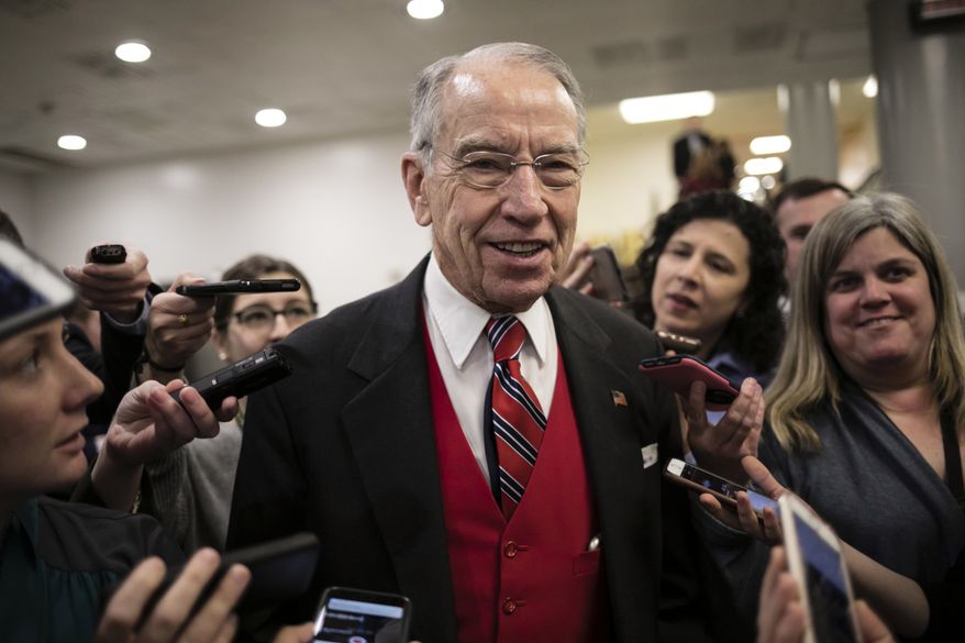 Senate Judiciary Committee Chairman Chuck Grassley, R-Iowa, speaks with reporters following a vote, at the Capitol in Washington, Thursday, Jan. 25, 2018. (AP Photo/J. Scott Applewhite) ** FILE **