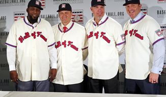 Baseball Hall of Fame inductees, from left, Vladimir Guerrero, Trevor Hoffman, Chipper Jones and Jim Thome, pose during news conference, Thursday, Jan. 25, 2018, in New York. (AP Photo/Frank Franklin II)