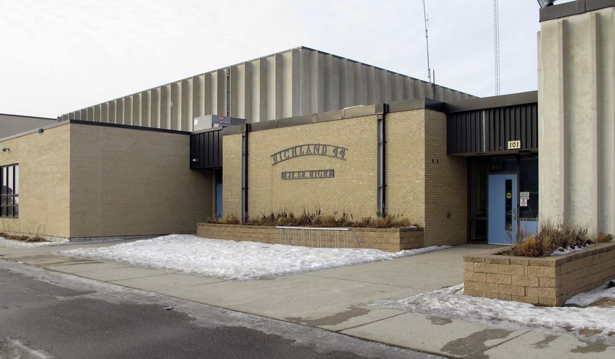 This Wednesday, Jan . 24, 2018, photo, shows an entrance to Richland High School in Colfax, N.D., where authorities are investigating alleged student misbehavior. School district Superintendent Tim Godfrey says the alleged misbehavior happened in the boys' locker room for seventh through 12th-graders. He says it might have involved sexual harassment. The Richland County Sheriff's Department is investigating. (AP Photo/Dave Kolpack)