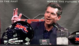 FILE - In this Feb. 3, 2000, Vince McMahon, chairman of the World Wrestling Federation, speaks during a news conference in New York. The XFL is set for a surprising second life, McMahon announced Thursday, Jan. 25, 2018. McMahon said the XFL would return in 2020 but offered few other details about the late winter/early spring football league. (AP Photo/Ed Bailey, File) **FILE**