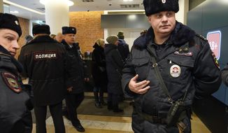 Russian police visit the Pioner movie theater in Moscow, Russia, Friday, Jan. 26, 2018. Pioner movie theater has been showing Scottish writer-director Armando Iannucci&#39;s &amp;quot;The Death of Stalin&amp;quot; since Thursday despite the Russian Culture Ministry&#39;s decision to rescind the permit for screening it. Police didn&#39;t declare the purpose of their visit to the theater Friday. (AP Photo/Alexander Zemlianichenko)