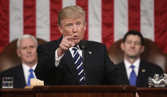 In this Feb. 28, 2017, file photo, President Donald Trump addresses a joint session of Congress on Capitol Hill in Washington. as Vice President Mike Pence and House Speaker Paul Ryan of Wis. listen. Trump will deliver his first State of the Union address on Tuesday, Jan. 30, 2018. (Jim Lo Scalzo/Pool Image via AP, File)