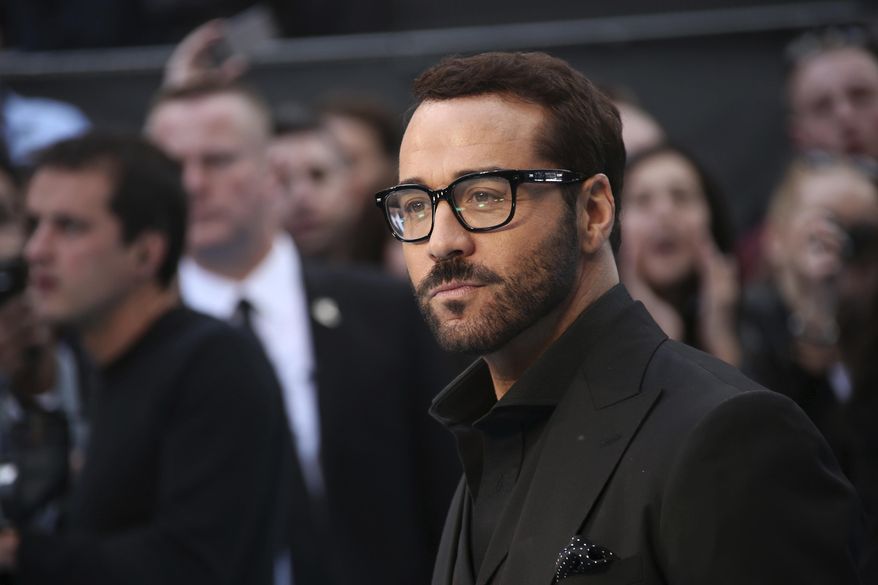 FILE - In this Tuesday, June 9, 2015 file photo, Jeremy Piven poses for photographers at the premiere of the film "Entourage," in London. An online news site says Piven is facing more sexual misconduct accusations. He previously denied allegations by at least three other women. BuzzFeed News reported Saturday, Jan. 27, 2018, that the latest accusations date back decades and involve three women who claim Piven acted in a physically aggressive or threatening manner. (Photo by Joel Ryan/Invision/AP, File)