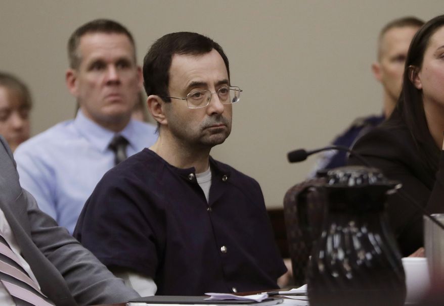 In this Jan. 24, 2018, file photo, Larry Nassar sits during his sentencing hearing in Lansing, Mich. (AP Photo/Carlos Osorio, File)
