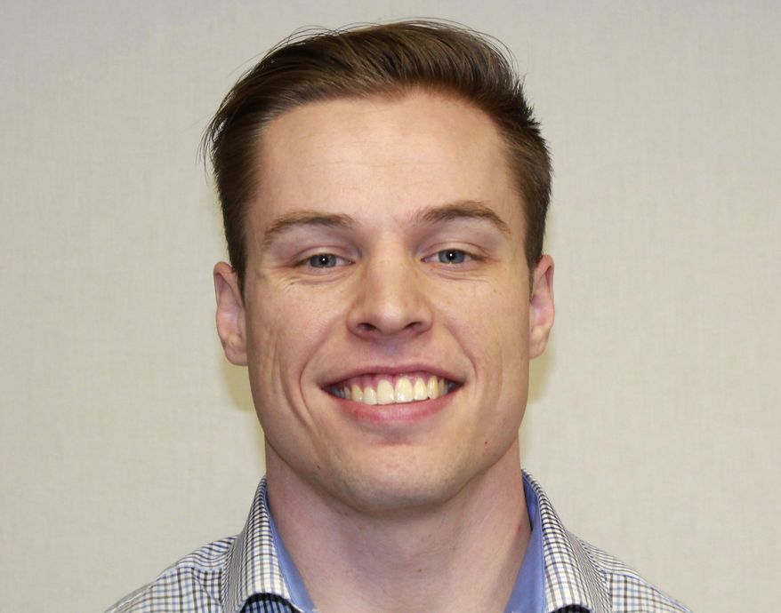 This undated photo provided by the Leavenworth Police Department in Leavenworth, Kan., shows Leavenworth police Officer Matthew Harrington. Authorities on Monday, Jan. 29, 2018, said that Harrington, who fatally shot a man in July 2017, has been fired for violating the department's use of deadly force policy. (Leavenworth Police Department via AP)