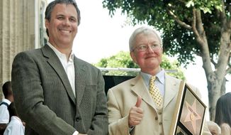 Former &quot;At the Movies&quot; co-host Richard Roeper (left) and founder Roger Ebert are seen in Los Angeles in 2005, when Mr. Ebert was honored with a star on the Hollywood Walk of Fame. (Associated Press)