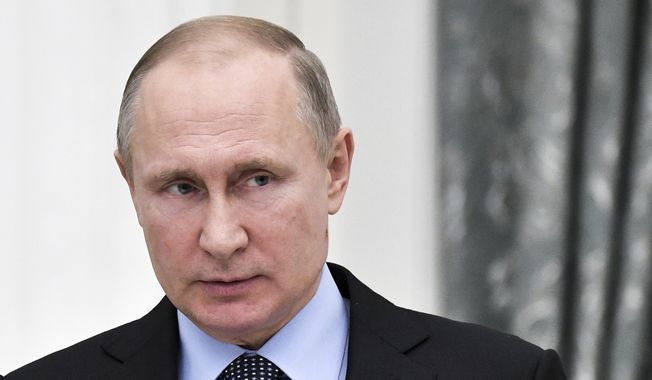 Russian President Vladimir Putin and Christopher Steele, author of a debunked anti-Trump dossier, had close associations among the cadre of business-ruling oligarchs, government reports show. (Associated Press/File)
