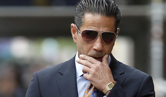In this Oct. 10, 2014 file photo, Joseph &quot;Skinny Joey&quot; Merlino arrives at federal court in Philadelphia. The reputed Philadelphia mob boss known for beating murder raps and reinventing himself as a restaurateur is facing fraud charges in a federal trial in New York City. Opening statements are set for Tuesday, Jan. 30, 2018 in Manhattan. (Yong Kim/Philadelphia Daily News via AP, File)