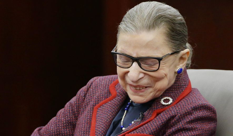 Supreme Court Justice Ruth Bader Ginsburg reacts to the welcome she receives before participating in a &amp;quot;fireside chat&amp;quot; in the Bruce M. Selya Appellate Courtroom at the Roger William University Law School on Tuesday, Jan. 30, 2018, in Bristol, R.I. (AP Photo/Stephan Savoia)