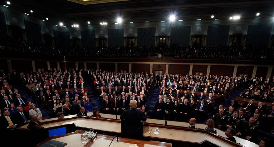 President Donald Trump delivers his State of the Union address to a joint session of U.S. Congress on Capitol Hill in Washington, Tuesday, Jan. 30, 2018. (Jim Bourg/Pool via AP)