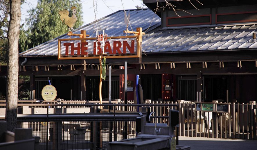 This Jan. 30, 2018 photo shows an exterior view of the animal enclosure where a miniature horse was killed by at least one large dog at the Happy Hollow Park and Zoo in San Jose, Calif. Four miniature horses and a Sicilian donkey have been mauled by dogs that got into pens at a Northern California children's zoo. Officials at San Jose's Happy Hollow Park and Zoo say one horse was killed after closing Jan. 14. (Dai Sugano/Bay Area News Group via AP)/San Jose Mercury News via AP)