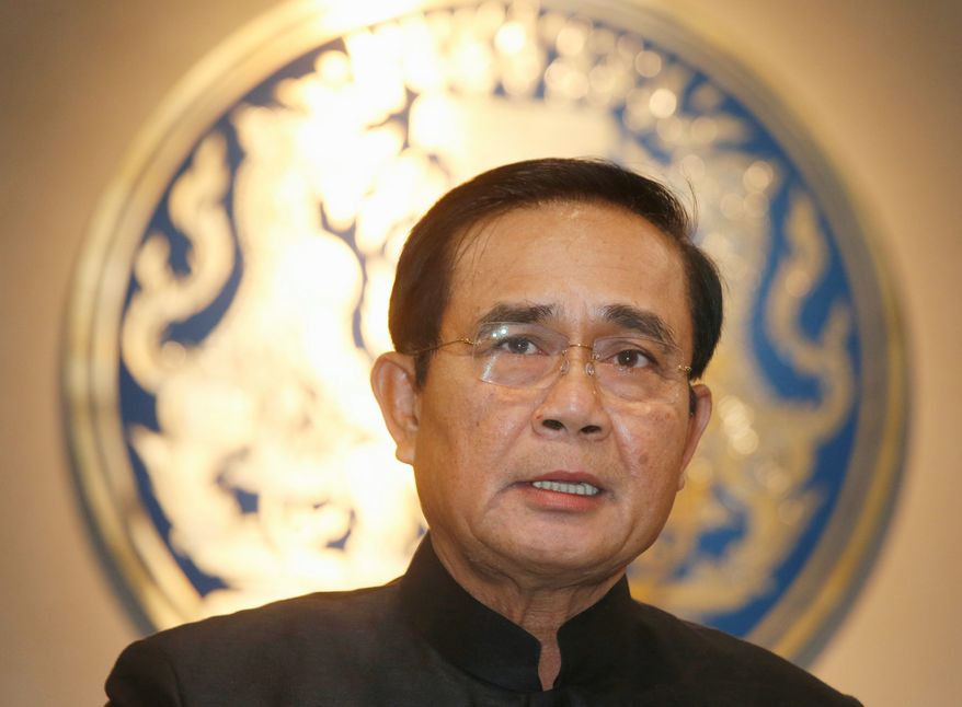 Thai Prime Minister Prayuth Chan-ocha rejected human rights groups’ criticism and refused to commit to holding national elections this year as he originally promised. (Associated Press/File)